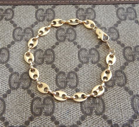 gucci bracelet vintage gold acorn|Gucci link to love.